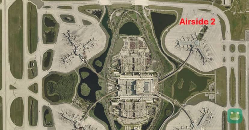 Aerial view of the Airside 2 gate expansion site at Orlando International Airport in late 2025, from the airport's project page; the planned premium lounge is not yet built