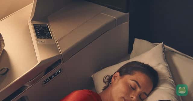 Delta promotional photo illustrating rest in a Delta One lie-flat suite.