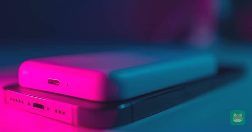 A magnetic power bank attached to the back of a phone