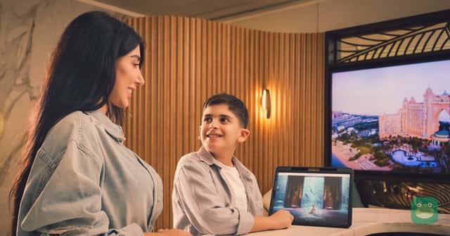 A mother and son book an Atlantis The Palm experience in Dubai. Photo: Emirates