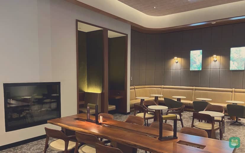 Soho Lounge, JFK Terminal 8 — seating by the fireplace