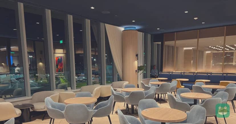 Chase Sapphire Lounge by The Club, BOS Terminal B — window lounge chairs