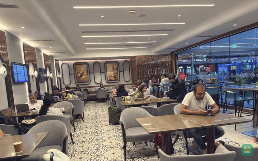 Encalm Lounge, DEL Terminal 3 Domestic — dining seating