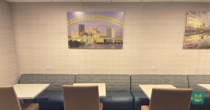 The Club PIT, PIT Airside Terminal — booth and table seating