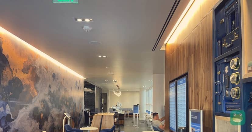 The Centurion Lounge, CLT Atrium — couches and workspace