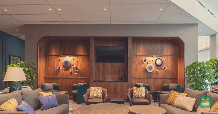 The Centurion Lounge, AMS Non-Schengen Piers — armchairs by the windows