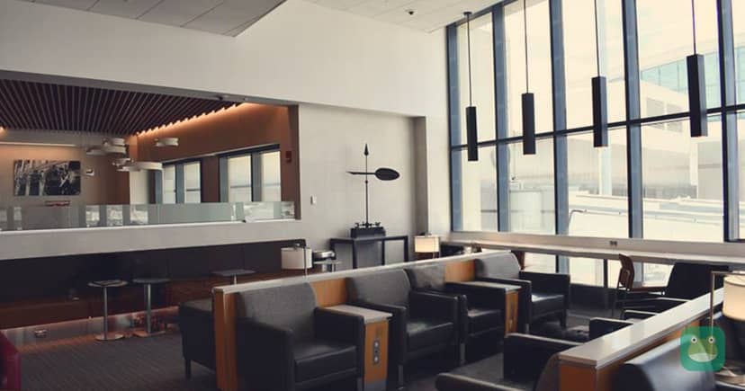 Seating with floor-to-ceiling windows in the Boston Admirals Club