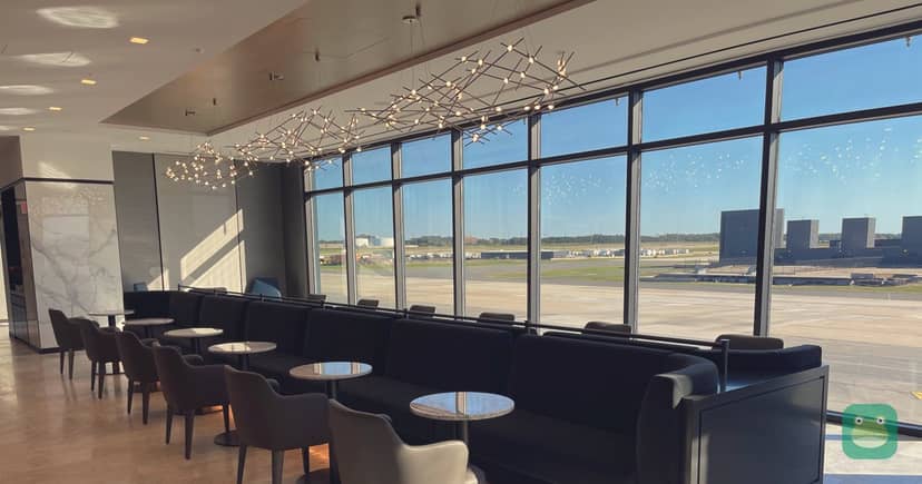 United Polaris Lounge, IAD Concourse C — lounge seating with apron views