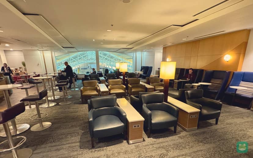 Delta Sky Club, PDX Concourse D — main room with bar and buffet