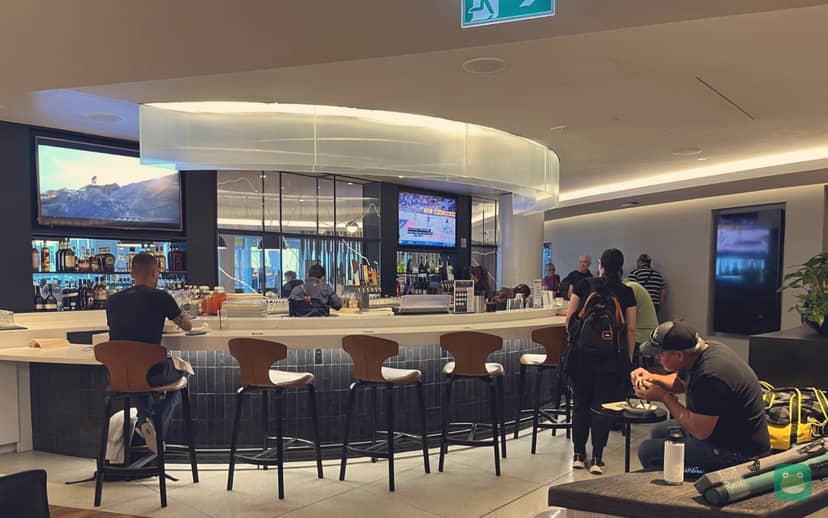 WestJet Elevation Lounge, YYC Domestic Terminal — bar seating