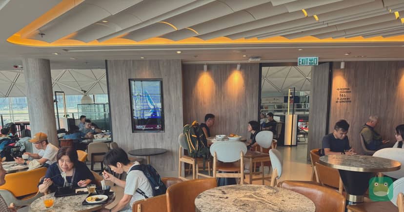 Plaza Premium Lounge (Gate 60), HKG Terminal 1 — dining area with standard and high-top tables