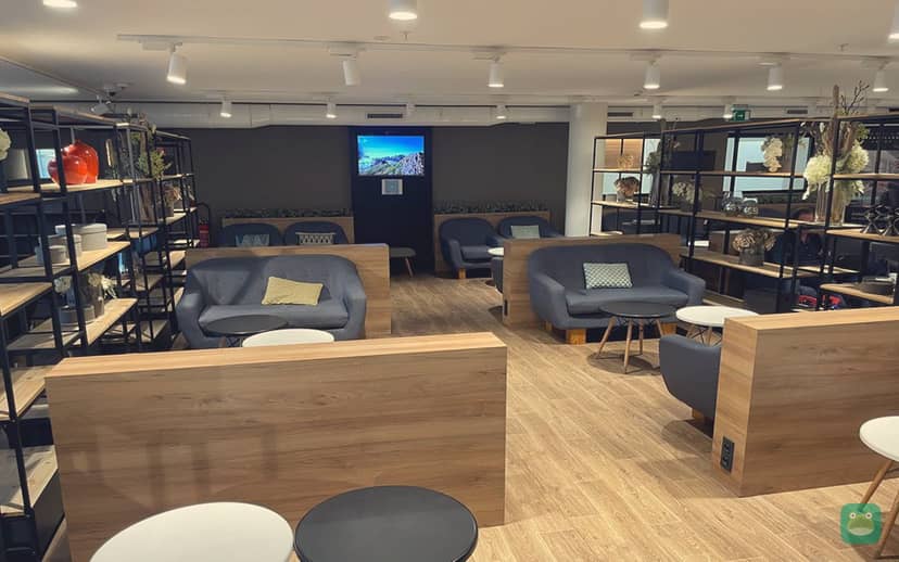 Premium Traveller Lounge, ORY Orly 1 — seating by the bay window