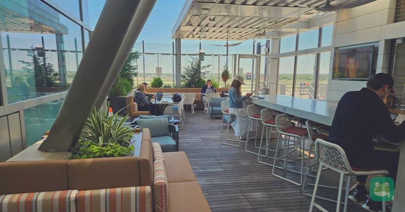Delta Sky Club, AUS Barbara Jordan Terminal — covered outdoor Sky Deck seating