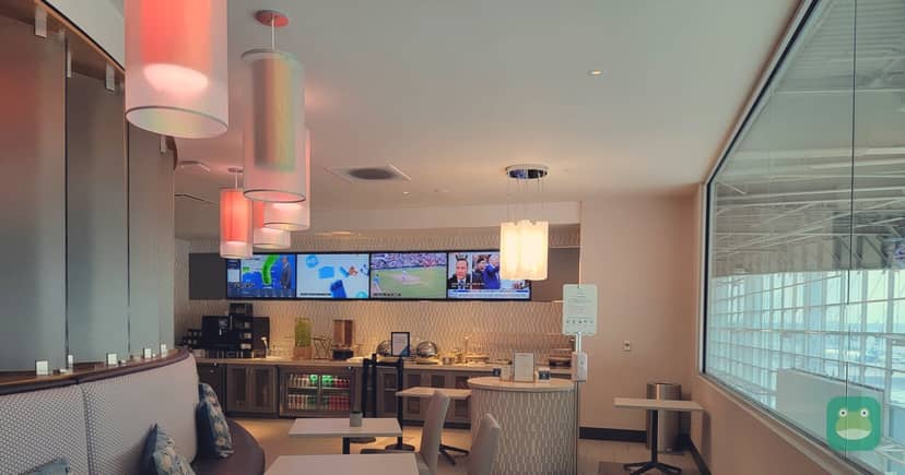 The Club MSY, MSY Concourse A — dining tables
